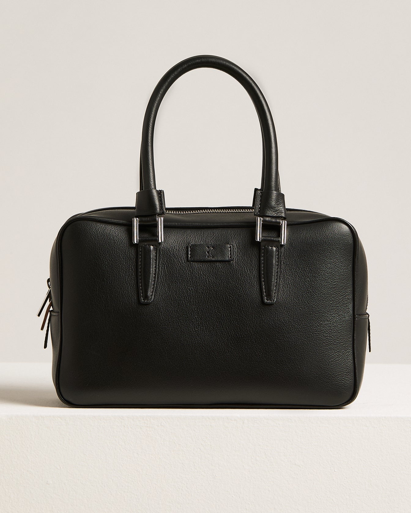 “kiss” black grained calfskin satchel