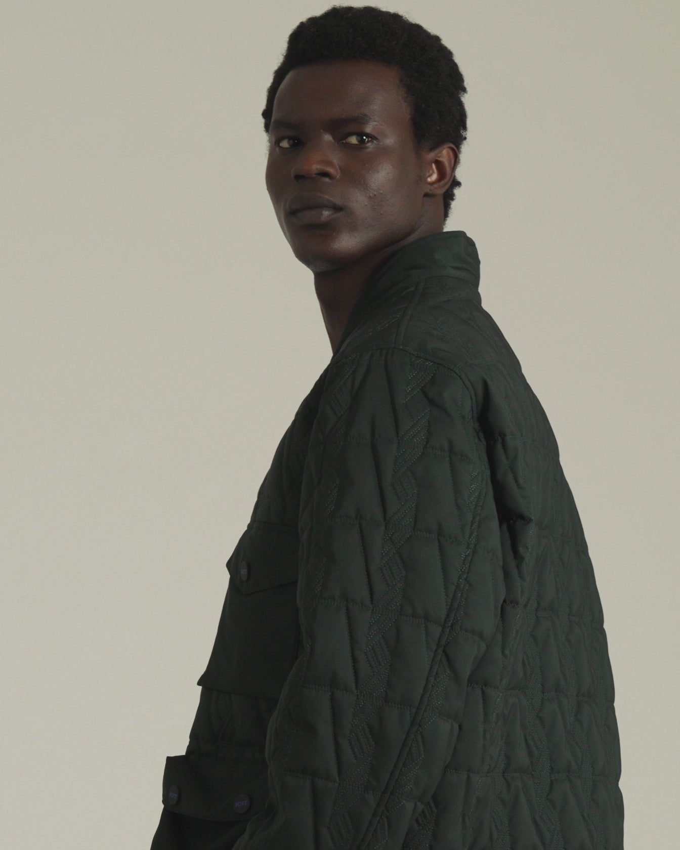 Men's green quilted jacquard jacket utility pockets | Kiton