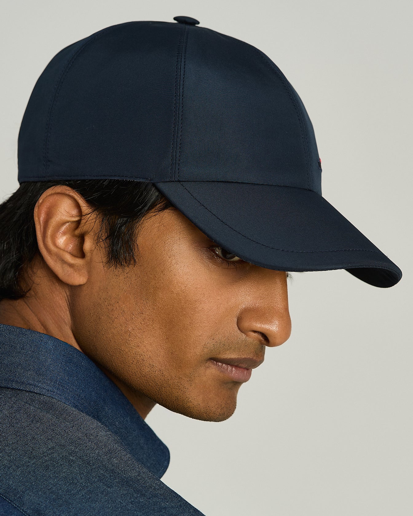 CAPPELLO BASEBALL IN TESSUTO TECNICO NERO